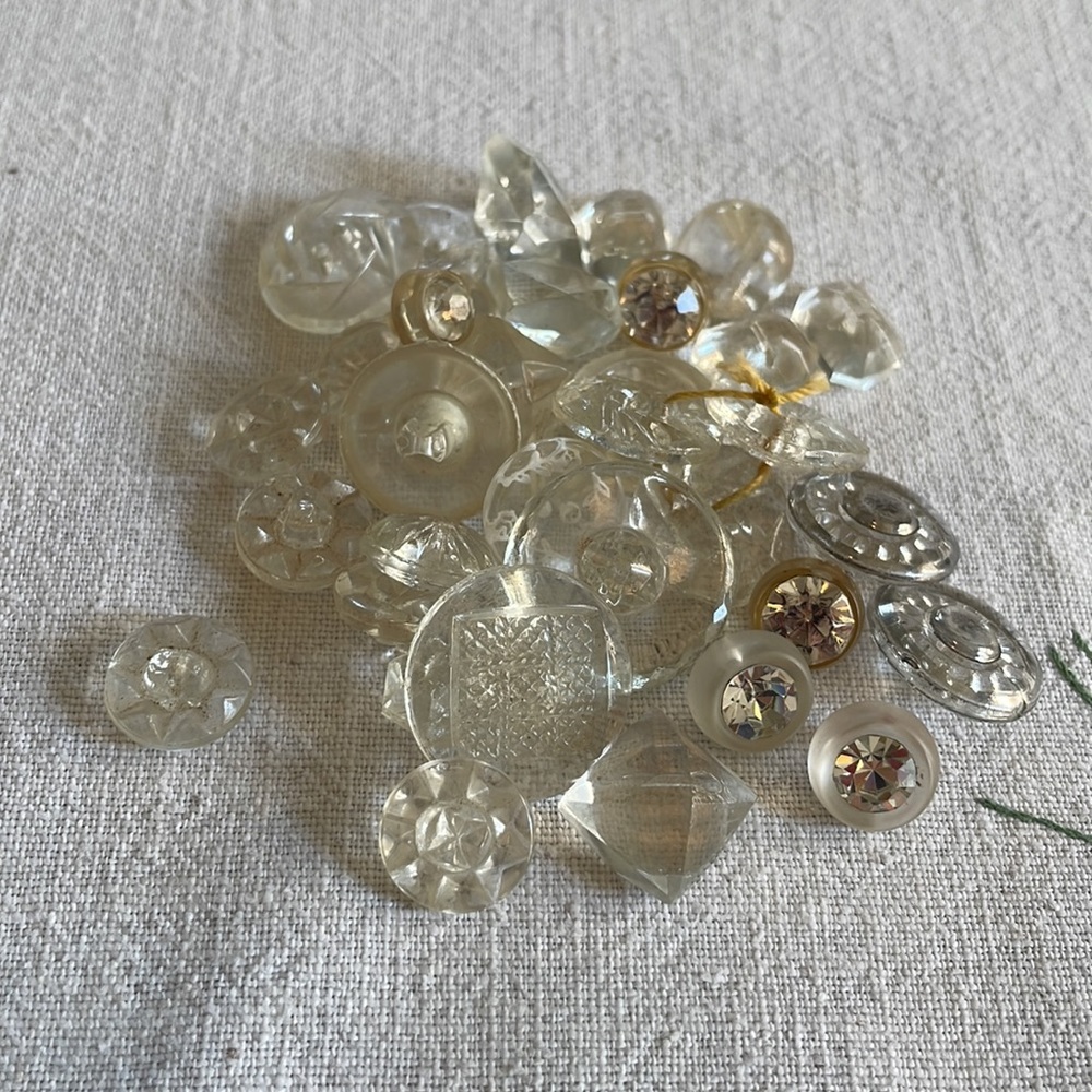 Assortment of vintage clear glass and plastic buttons